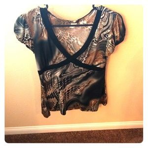 Must be sold by 8/10/18! Animal print blouse.